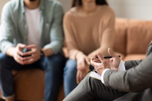 A couple consulting a lawyer after their car accident